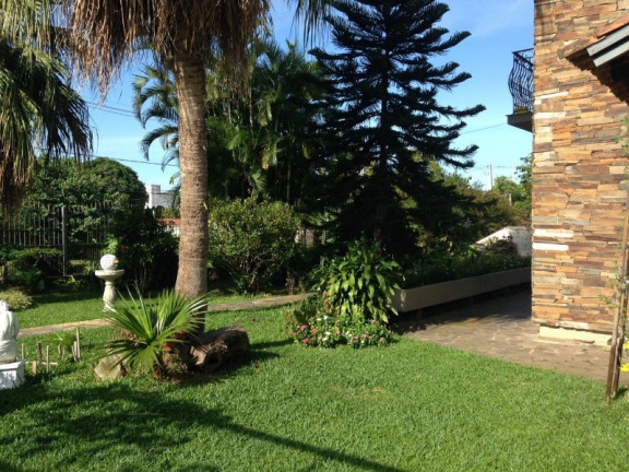 Imagem Casa com 3 Quartos à Venda, 339 m² em Ipanema - Porto Alegre