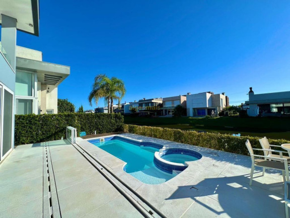 Imagem Casa com 3 Quartos à Venda, 317 m² em Condominio Capao Ilhas Resort - Capão Da Canoa Imagem Casa com 3 Quartos à Venda, 317 m² em Condominio Capao Ilhas Resort - Capão Da Canoa