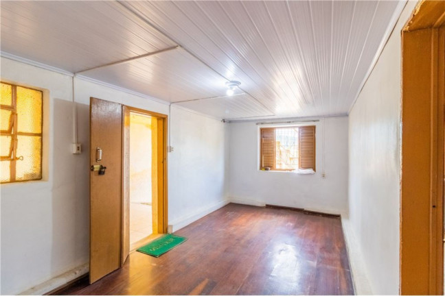 Imagem Casa com 5 Quartos à Venda,  em Partenon - Porto Alegre