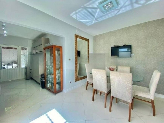 Imagem Casa com 4 Quartos à Venda, 233 m² em Menino Deus - Porto Alegre
