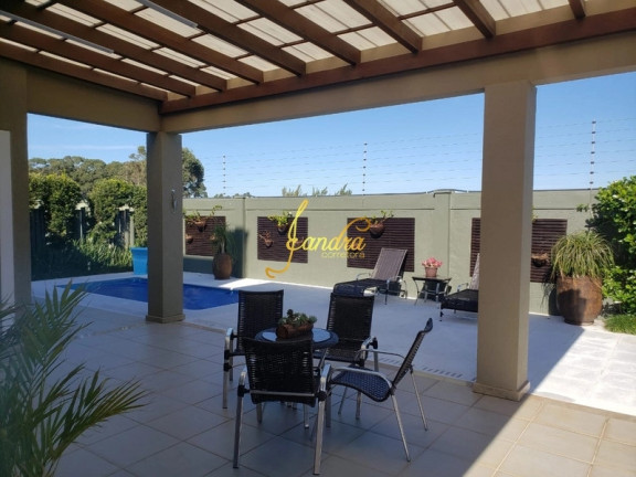 Imagem Casa de Condomínio com 4 Quartos à Venda, 350 m² em Remanso - Xangri-la