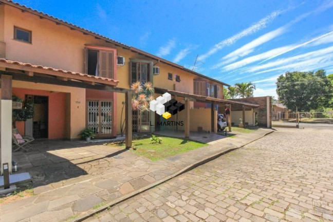 Imagem Casa com 4 Quartos à Venda, 117 m² em Cavalhada - Porto Alegre