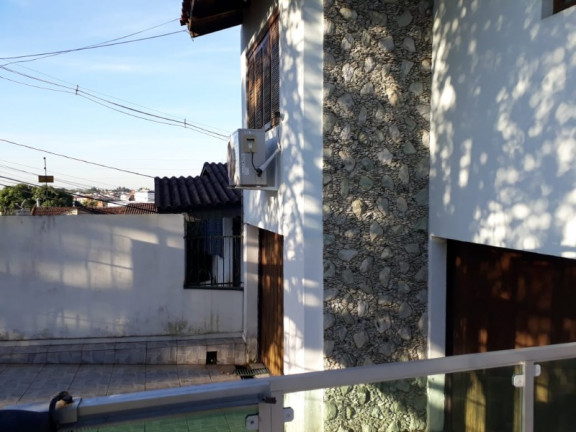 Imagem Casa com 4 Quartos à Venda, 237 m² em Parque Santa Fé - Porto Alegre Imagem Casa com 4 Quartos à Venda, 237 m² em Parque Santa Fé - Porto Alegre