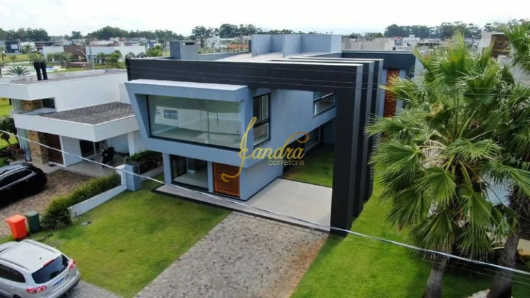 Imagem Casa de Condomínio com 5 Quartos à Venda, 310 m² em Zona Nova - Capão Da Canoa