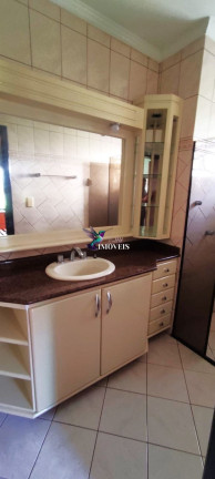 Imagem Sobrado com 5 Quartos à Venda, 338 m² em Jardim Itu - Porto Alegre
