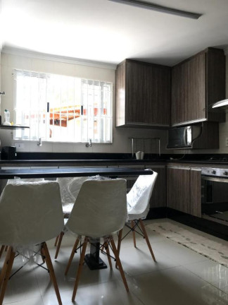 Imagem Sobrado com 4 Quartos à Venda, 212 m² em Tupi - Praia Grande