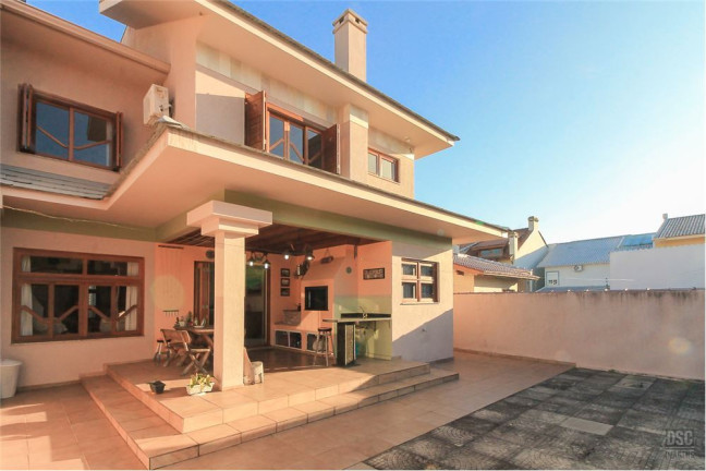 Imagem Casa com 3 Quartos à Venda, em Guarujá - Porto Alegre Imagem Casa com 3 Quartos à Venda, em Guarujá - Porto Alegre