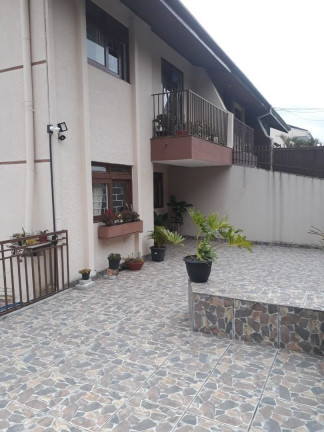 Imagem Casa com 4 Quartos à Venda, 100 m² em Guabirotuba - Curitiba