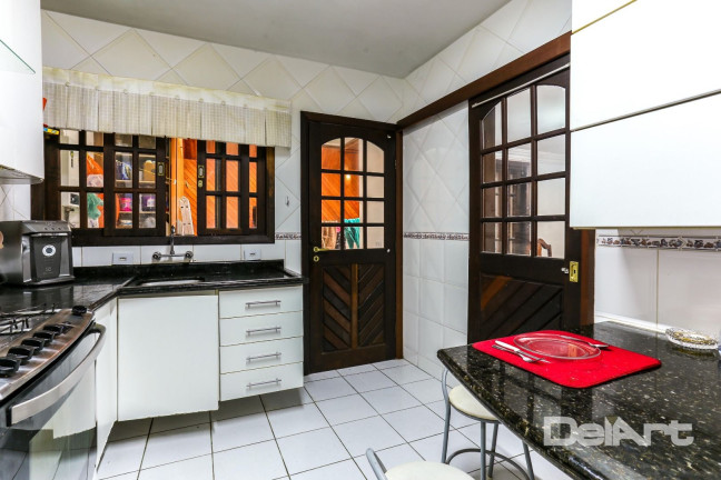 Imagem Sobrado com 4 Quartos à Venda, 221 m² em Jardim Das Américas - Curitiba