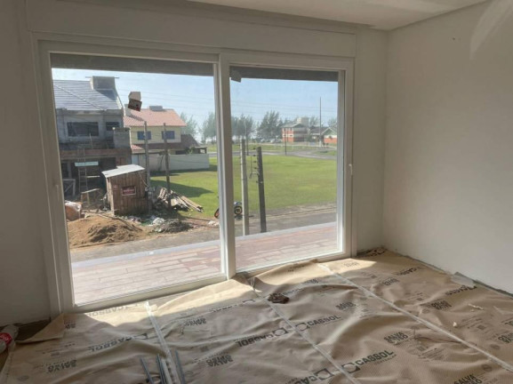 Imagem Sobrado com 3 Quartos à Venda, 217 m² em Village - Capao Da Canoa