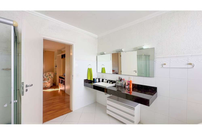 Imagem Casa com 4 Quartos à Venda, 394 m² em Vila Assunção - Porto Alegre