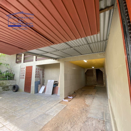 Imagem Casa com 3 Quartos à Venda, 192 m² em Vila Nova - Porto Alegre Imagem Casa com 3 Quartos à Venda, 192 m² em Vila Nova - Porto Alegre