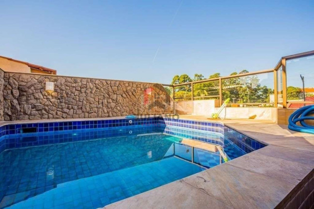 Imagem Casa com 4 Quartos à Venda, 376 m² em Jardim Itu - Porto Alegre