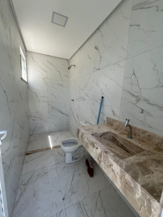 Imagem Casa com 4 Quartos à Venda, 251 m² em Cidade Alpha - Eusébio