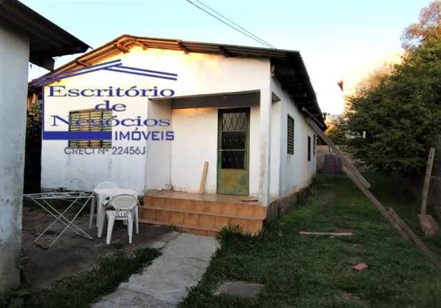 Imagem Casa com 3 Quartos à Venda, 204 m² em Vila Nova - Porto Alegre