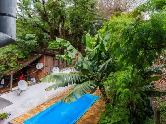 Imagem Casa com 4 Quartos à Venda, 280 m² em Vila Jardim - Porto Alegre