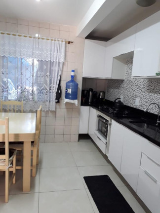 Imagem Sobrado com 5 Quartos à Venda, 210 m² em Rubem Berta - Porto Alegre