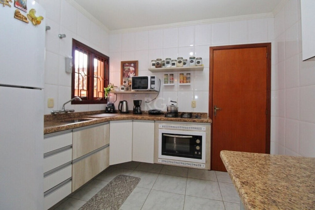 Imagem Casa de Condomínio com 3 Quartos à Venda, 172 m² em Medianeira - Porto Alegre Imagem Casa de Condomínio com 3 Quartos à Venda, 172 m² em Medianeira - Porto Alegre