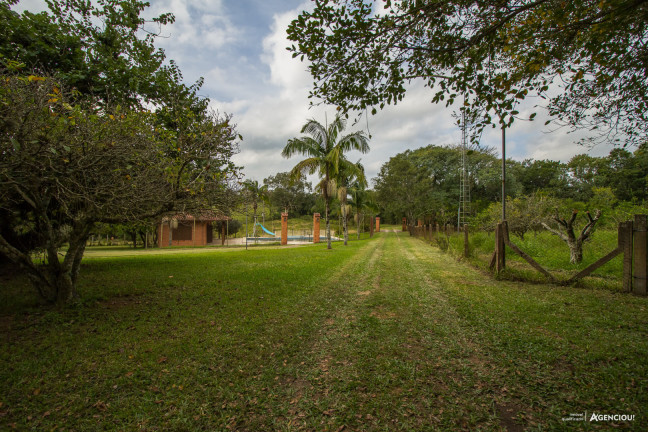 Imagem Casa com 5 Quartos à Venda, 207.606 m² em Tarumã - Viamão