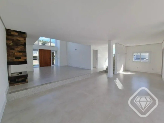 Imagem Casa de Condomínio com 4 Quartos à Venda,  em Vila Nova - Porto Alegre