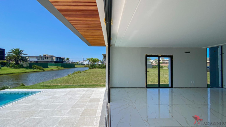 Imagem Casa de Condomínio com 4 Quartos à Venda, 400 m² em Praia Da Cal - Torres