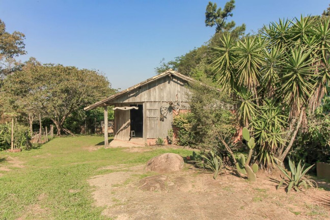 Imagem Casa com 4 Quartos à Venda, 200 m² em Vila Nova - Porto Alegre