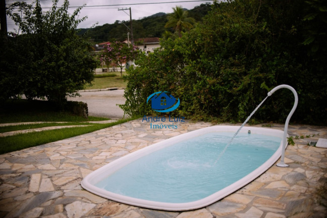 Imagem Casa de Condomínio com 4 Quartos à Venda, 184 m² em Horto Florestal - Ubatuba