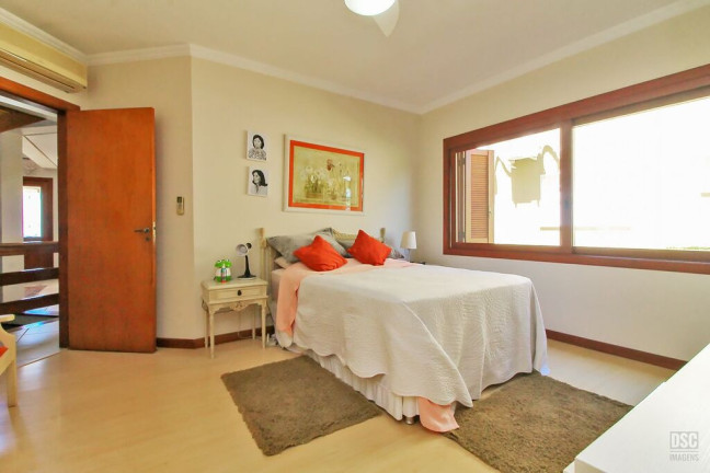 Imagem Casa de Condomínio com 3 Quartos à Venda, 389 m² em Vila Nova - Porto Alegre