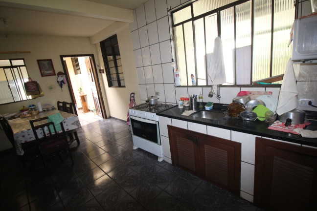 Imagem Casa com 4 Quartos à Venda, 131 m² em Uberaba - Curitiba