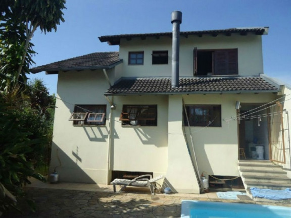 Imagem Casa com 3 Quartos à Venda, 226 m² em Parque Santa Fé - Porto Alegre Imagem Casa com 3 Quartos à Venda, 226 m² em Parque Santa Fé - Porto Alegre