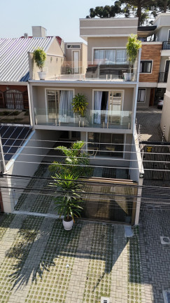 Imagem Sobrado com 3 Quartos à Venda, 205 m² em Jardim Das Américas - Curitiba