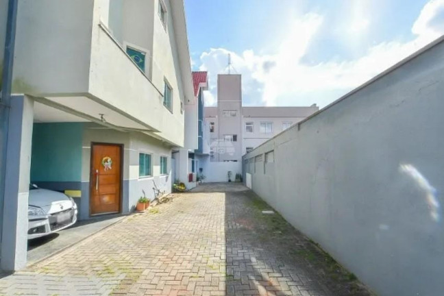 Imagem Casa com 3 Quartos à Venda, 190 m² em Novo Mundo - Curitiba Imagem Casa com 3 Quartos à Venda, 190 m² em Novo Mundo - Curitiba