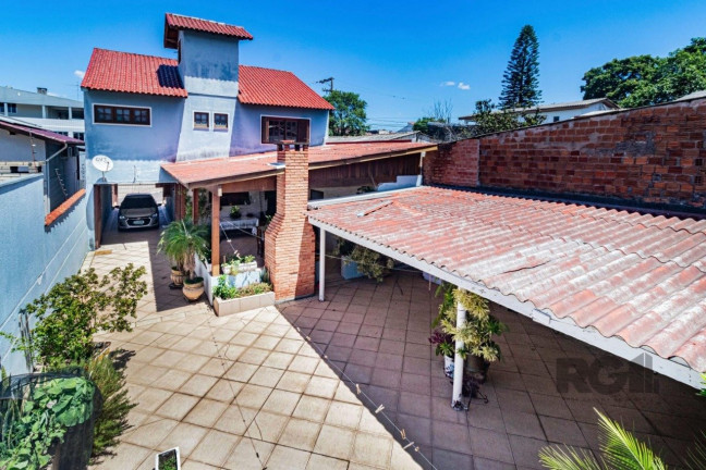 Imagem Casa com 3 Quartos à Venda, 232 m² em Vera Cruz - Gravataí Imagem Casa com 3 Quartos à Venda, 232 m² em Vera Cruz - Gravataí