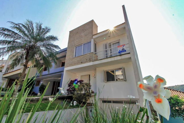 Imagem Casa de Condomínio com 3 Quartos à Venda, 205 m² em Vila Nova - Porto Alegre