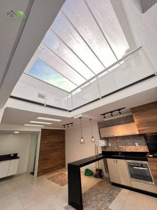 Imagem Casa de Condomínio com 3 Quartos à Venda, 205 m²