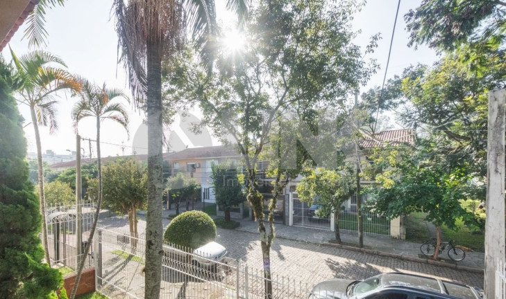 Imagem Sobrado com 3 Quartos à Venda, 316 m² em Jardim Lindóia - Porto Alegre