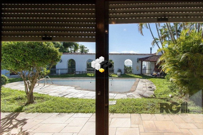 Imagem Casa com 3 Quartos à Venda, 580 m² em Santa Tereza - Porto Alegre Imagem Casa com 3 Quartos à Venda, 580 m² em Santa Tereza - Porto Alegre