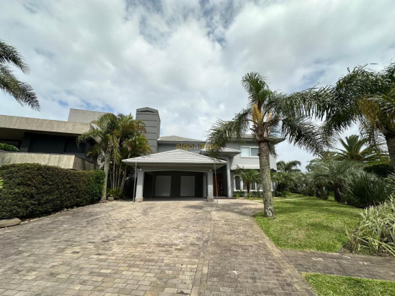 Imagem Casa com 5 Quartos à Venda, 430 m² em Condominio Atlantida Ilhas Park - Xangri-lá Imagem Casa com 5 Quartos à Venda, 430 m² em Condominio Atlantida Ilhas Park - Xangri-lá