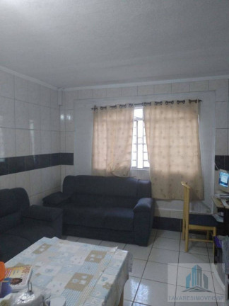 Imagem Sobrado com 5 Quartos à Venda, 210 m²