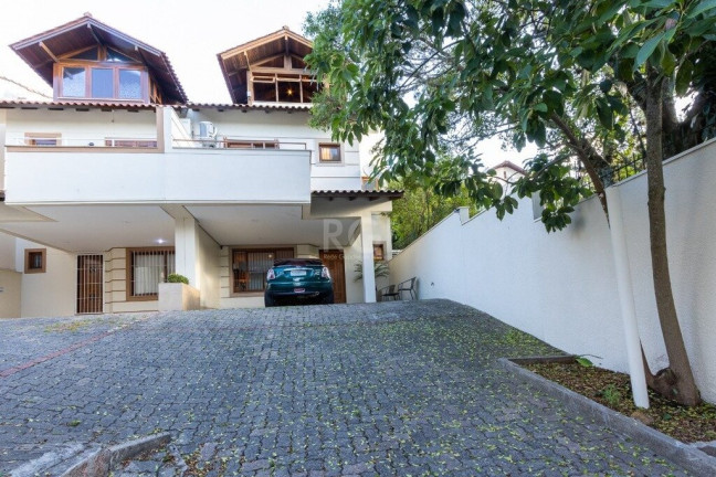 Imagem Casa de Condomínio com 3 Quartos à Venda, 217 m² em Tristeza - Porto Alegre