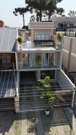Imagem Sobrado com 3 Quartos à Venda, 205 m² em Jardim Das Américas - Curitiba