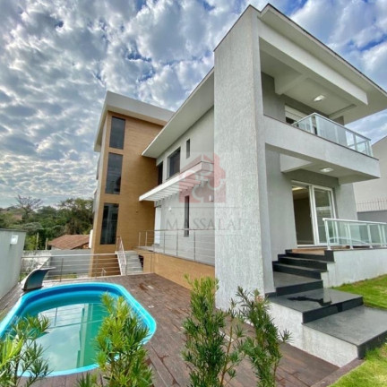 Imagem Casa com 4 Quartos à Venda, 598 m² em Espírito Santo - Porto Alegre Imagem Casa com 4 Quartos à Venda, 598 m² em Espírito Santo - Porto Alegre