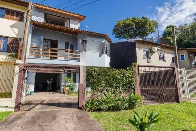 Imagem Casa com 3 Quartos à Venda, 396 m² em Partenon - Porto Alegre