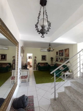 Imagem Casa com 4 Quartos à Venda, 329 m² em Vila Nova - Porto Alegre
