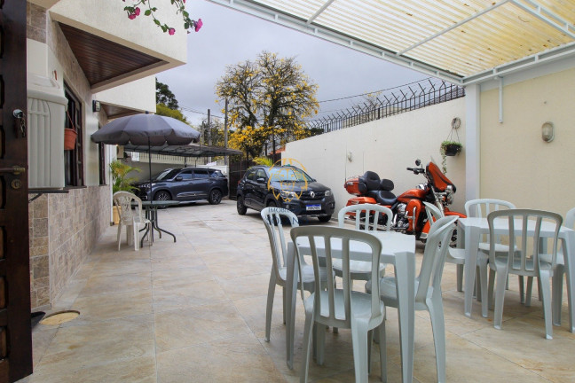 Imagem Sobrado com 4 Quartos à Venda, 259 m² em Jardim Das Américas - Curitiba