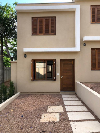 Imagem Casa de Condomínio com 2 Quartos à Venda, 121 m² em Teresópolis - Porto Alegre