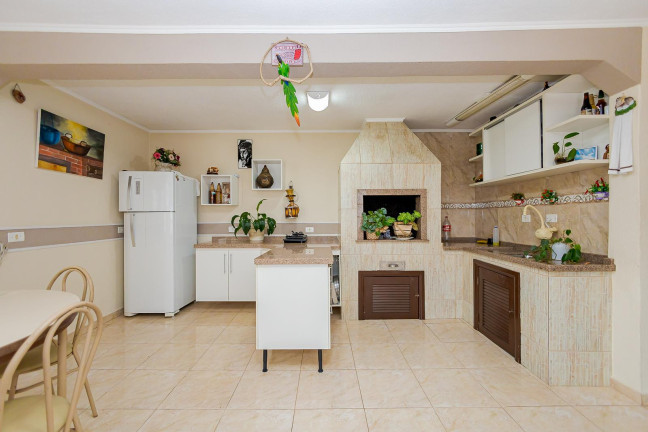 Imagem Casa com 4 Quartos à Venda, 271 m² em Santo Inácio - Curitiba