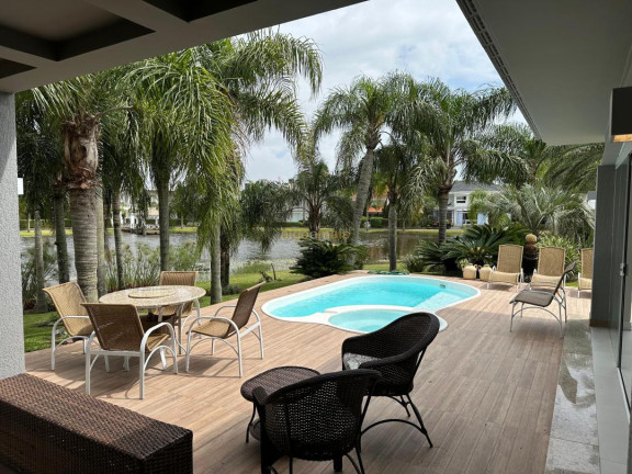 Imagem Casa com 5 Quartos à Venda, 430 m² em Condominio Atlantida Ilhas Park - Xangri-lá Imagem Casa com 5 Quartos à Venda, 430 m² em Condominio Atlantida Ilhas Park - Xangri-lá