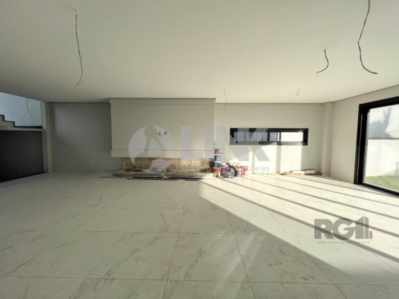 Imagem Imóvel com 4 Quartos à Venda, 371 m² em Vila Nova - Porto Alegre