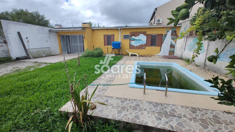 Imagem Casa com 4 Quartos à Venda, 144 m² em Laranjal - Pelotas